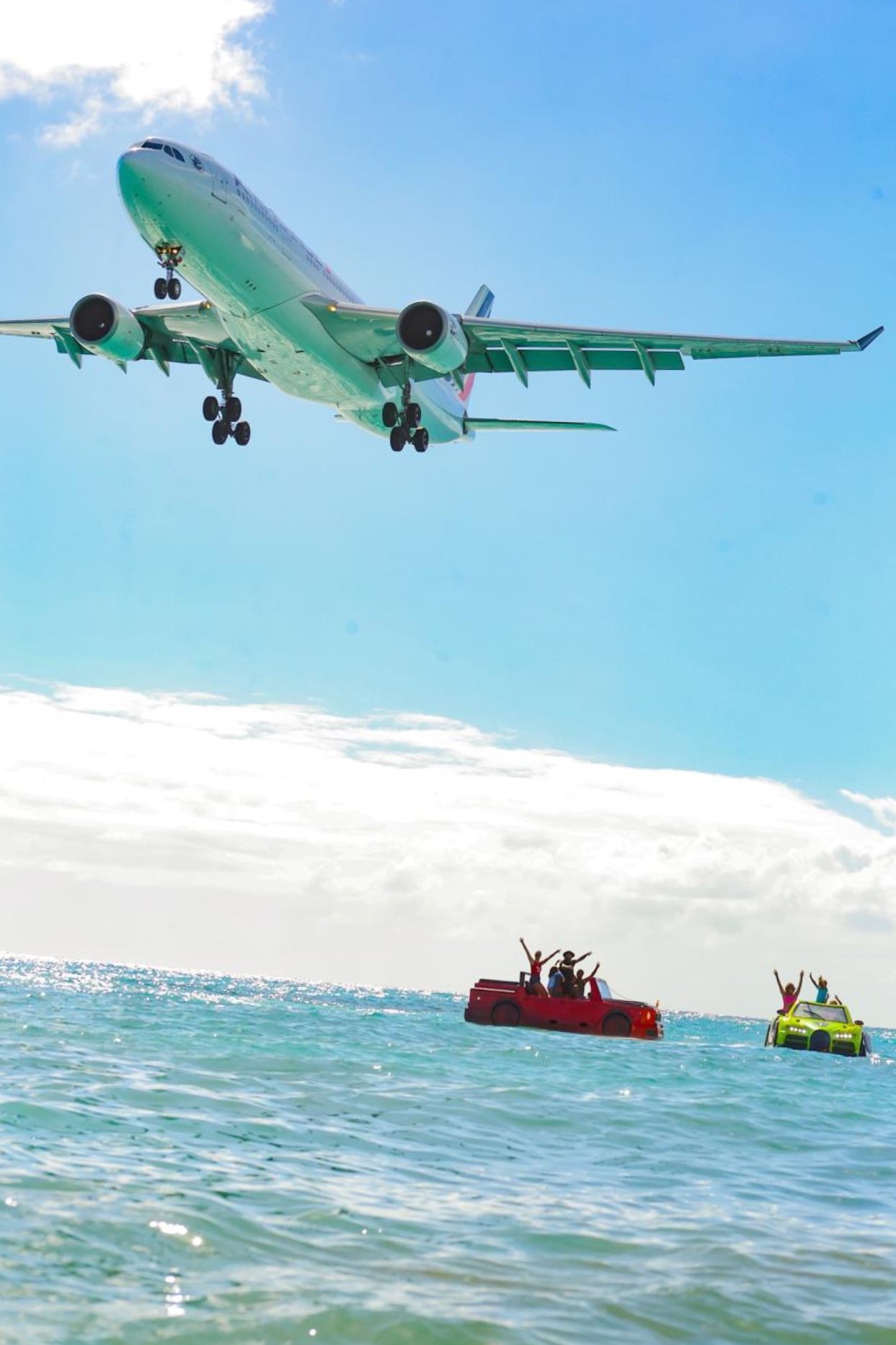 Wide-body jet descending low over Maho Beach in Sint Maarten